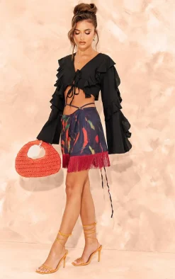 Black Leaf Print Tassel Hem Wrap Mini Skirt