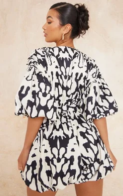 Black Print Plunge Puffball Hem Romper