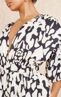 Black Print Plunge Puffball Hem Romper