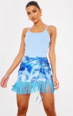 Blue Butterfly Print Tassel Hem Wrap Mini Skirt