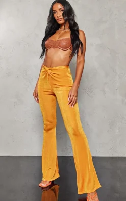 Bright Orange Slinky Acetate Twist Front Flares