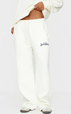 Cream Contrast Embroidered Saint Louis Low Rise Wide Leg Sweatpants