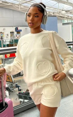 Cream Oversized Heart Embossed Runner Shorts