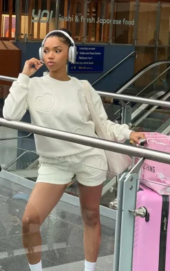 Cream Oversized Heart Embossed Runner Shorts