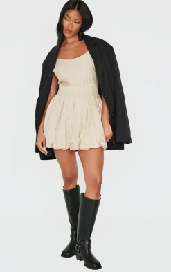 Cream Textured Buckle Strap Puffball Dress