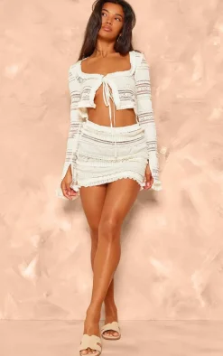 Cream Textured Ruffle Cut Out Tie Bodycon Dress