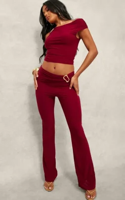 Dark Red Slinky Fold Over Metal Trim Skinny Flare Pants