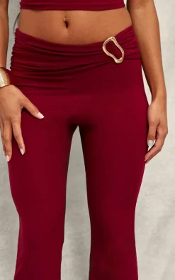 Dark Red Slinky Fold Over Metal Trim Skinny Flare Pants