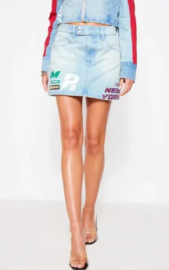 Light Blue Wash Racer Graphic Denim Mini Skirt