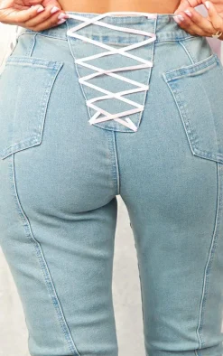 Petite Mid Blue Wash Denim Flares With Ribbon Details