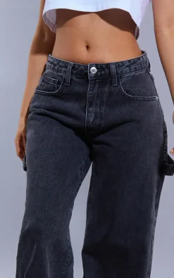Petite Washed Black Wide Leg Jeans With Strap Detail