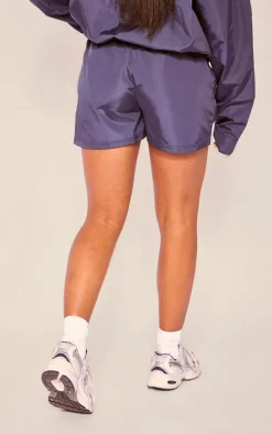 PLT SPORT Navy Shell Badge Runner Shorts