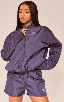 PLT SPORT Navy Shell Badge Runner Shorts