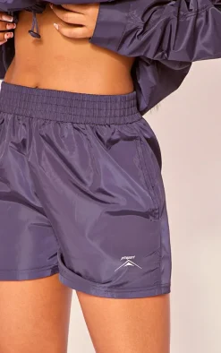 PLT SPORT Navy Shell Badge Runner Shorts