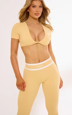 PLT SPORT Peach Sculpt Twist Front Contrast Detail Open Back Crop Top