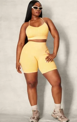PLT SPORT Plus Mustard Acid Wash Seamless Rib Ruched Bum Booty Shorts