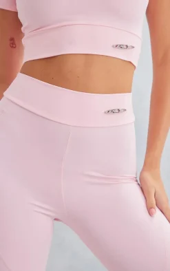 PRETTYLITTLETHING Baby Pink Sport Metal Badge Sculpt High Waist Flare Pants