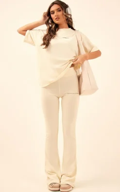 PRETTYLITTLETHING Beige Printed Flared Pants