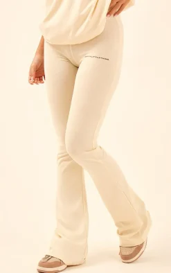 PRETTYLITTLETHING Beige Printed Flared Pants