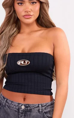 PRETTYLITTLETHING Black Metal Badge Snatched Rib Bandeau Top