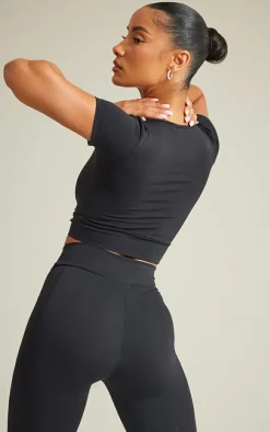 PRETTYLITTLETHING Black Sport Metal Badge Sculpt Short Sleeve Crop Top