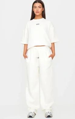 PRETTYLITTLETHING Cream Badge Detail Mid Rise Wide Leg Sweatpants