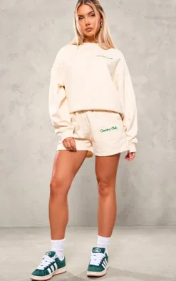 PRETTYLITTLETHING Cream Embroidered Country Club Washed Sweat Shorts