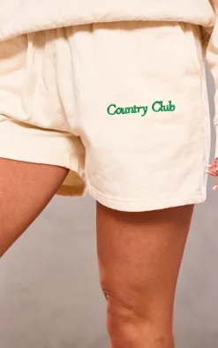 PRETTYLITTLETHING Cream Embroidered Country Club Washed Sweat Shorts