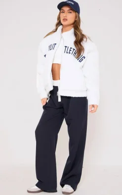 PRETTYLITTLETHING Cream Graphic Zip Up Fleece Jacket