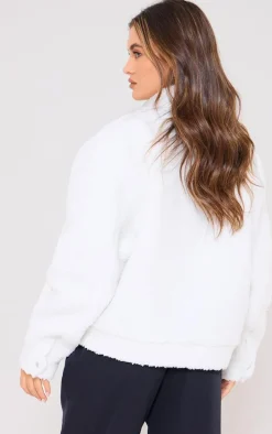 PRETTYLITTLETHING Cream Graphic Zip Up Fleece Jacket