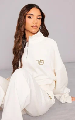 PRETTYLITTLETHING Cream Logo Embroidered Half Zip Sweatshirt