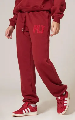 PRETTYLITTLETHING Dark Red Borg Applique Cuffed Sweatpants