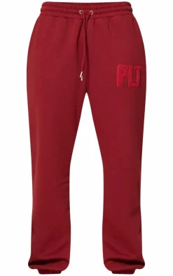 PRETTYLITTLETHING Dark Red Borg Applique Cuffed Sweatpants