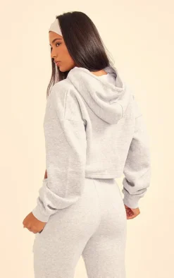 PRETTYLITTLETHING Grey Marl Copyright Graphic Zip Through Crop Hoodie