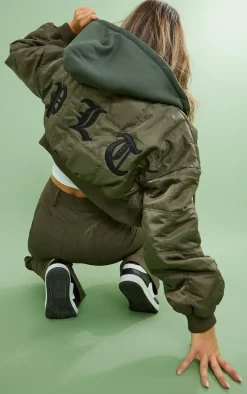 PRETTYLITTLETHING Khaki Graphic Back Jersey Hooded Bomber Jacket
