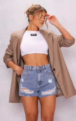 PRETTYLITTLETHING Light Blue Wash Ripped Hem Denim Shorts