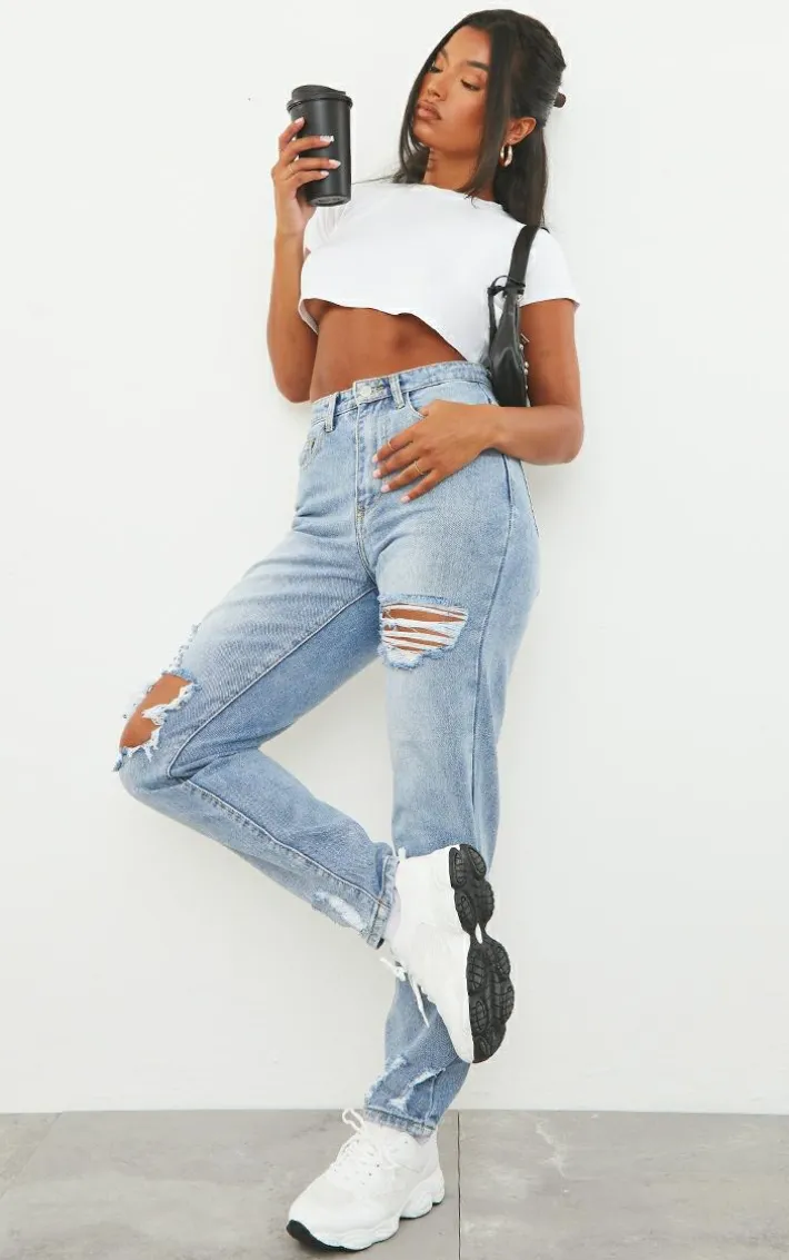 PRETTYLITTLETHING Light Blue Wash Open Knee Ripped Hem Mom Jeans