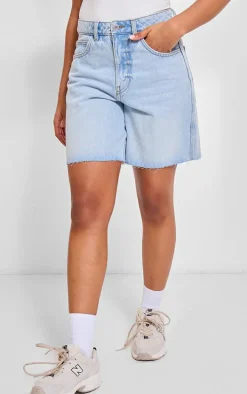 PRETTYLITTLETHING Light Blue Wash Raw Hem Longline Loose Fit Denim Shorts