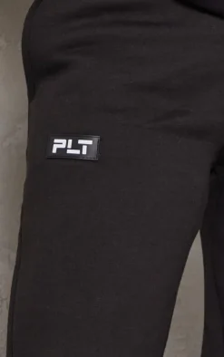 PRETTYLITTLETHING Logo Black Badge Detail Straight Sweatpants