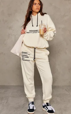 PRETTYLITTLETHING Logo Cream Graphic Print Sweatpants
