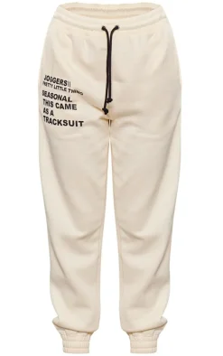PRETTYLITTLETHING Logo Cream Graphic Print Sweatpants