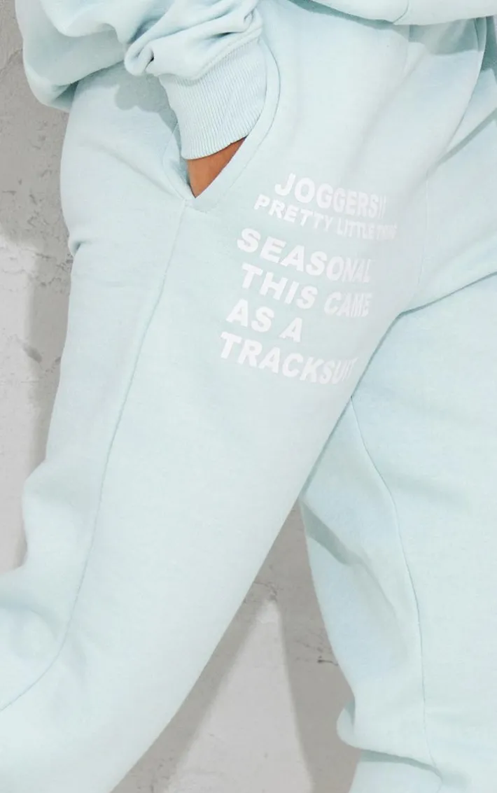 PRETTYLITTLETHING Logo Light Blue Graphic Printed Sweatpants