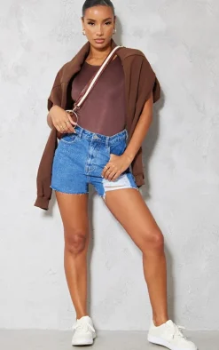 PRETTYLITTLETHING Mid Blue Wash Ripped Denim Mom Shorts