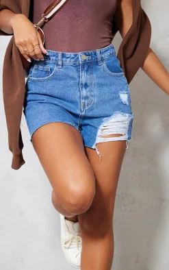 PRETTYLITTLETHING Mid Blue Wash Ripped Denim Mom Shorts
