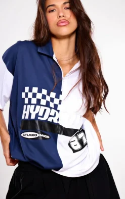 PRETTYLITTLETHING Navy Zip Up Short Sleeve Football Shirt