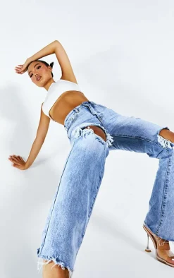 PRETTYLITTLETHING Petite Light Blue Wash Ripped Long Leg Straight Jeans