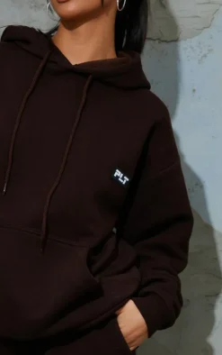 PRETTYLITTLETHING Petite Chocolate Bandage Detail Oversize Hoodie