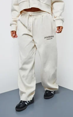 PRETTYLITTLETHING Petite Cream Premium Print Wide Leg Sweatpants