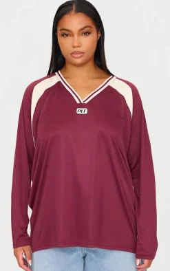 PRETTYLITTLETHING Plus Burgundy Studio Mode Long Sleeve Football T-shirt