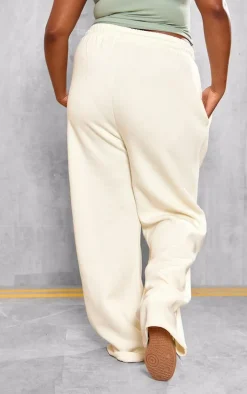 PRETTYLITTLETHING Plus Cream Athletics Club Embroidered Wide Leg Sweatpants